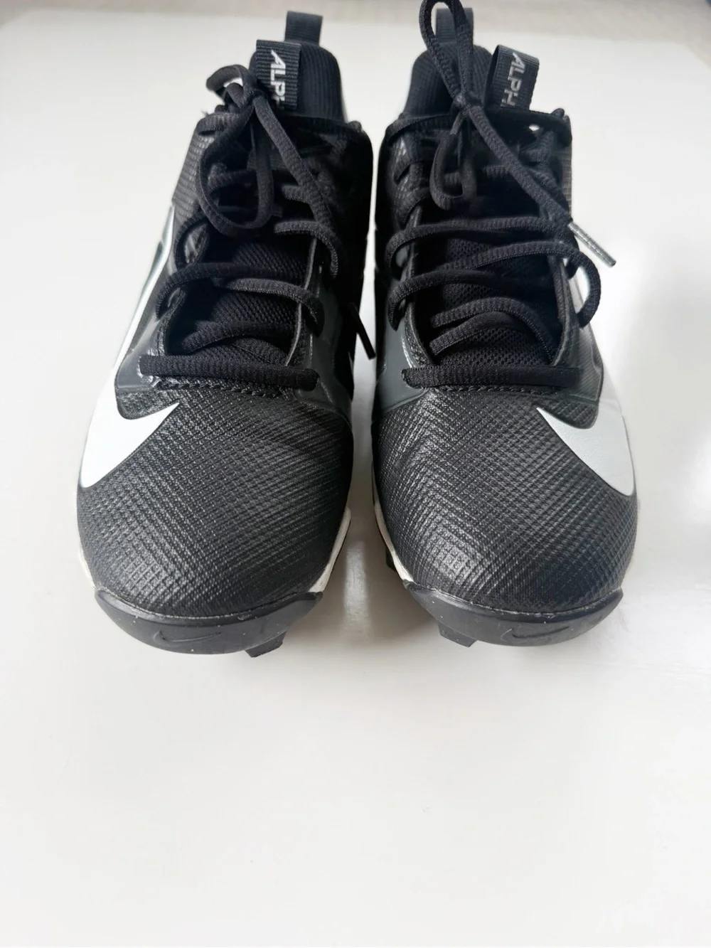 Nike Kids Black and Silver Cleats